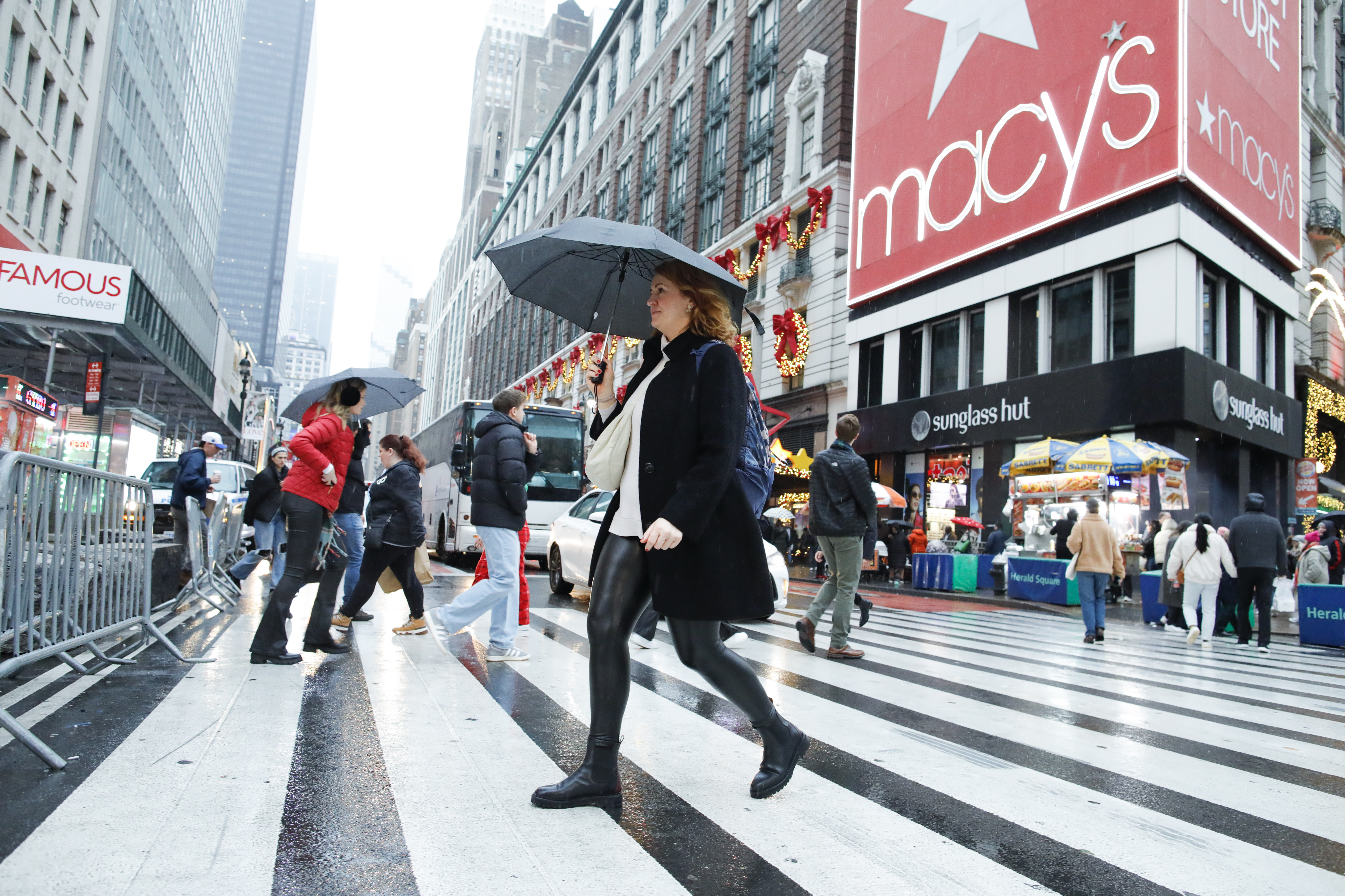 American clothing retailers say they are fighting to attract shoppers who are living “paycheck-to-paycheck”