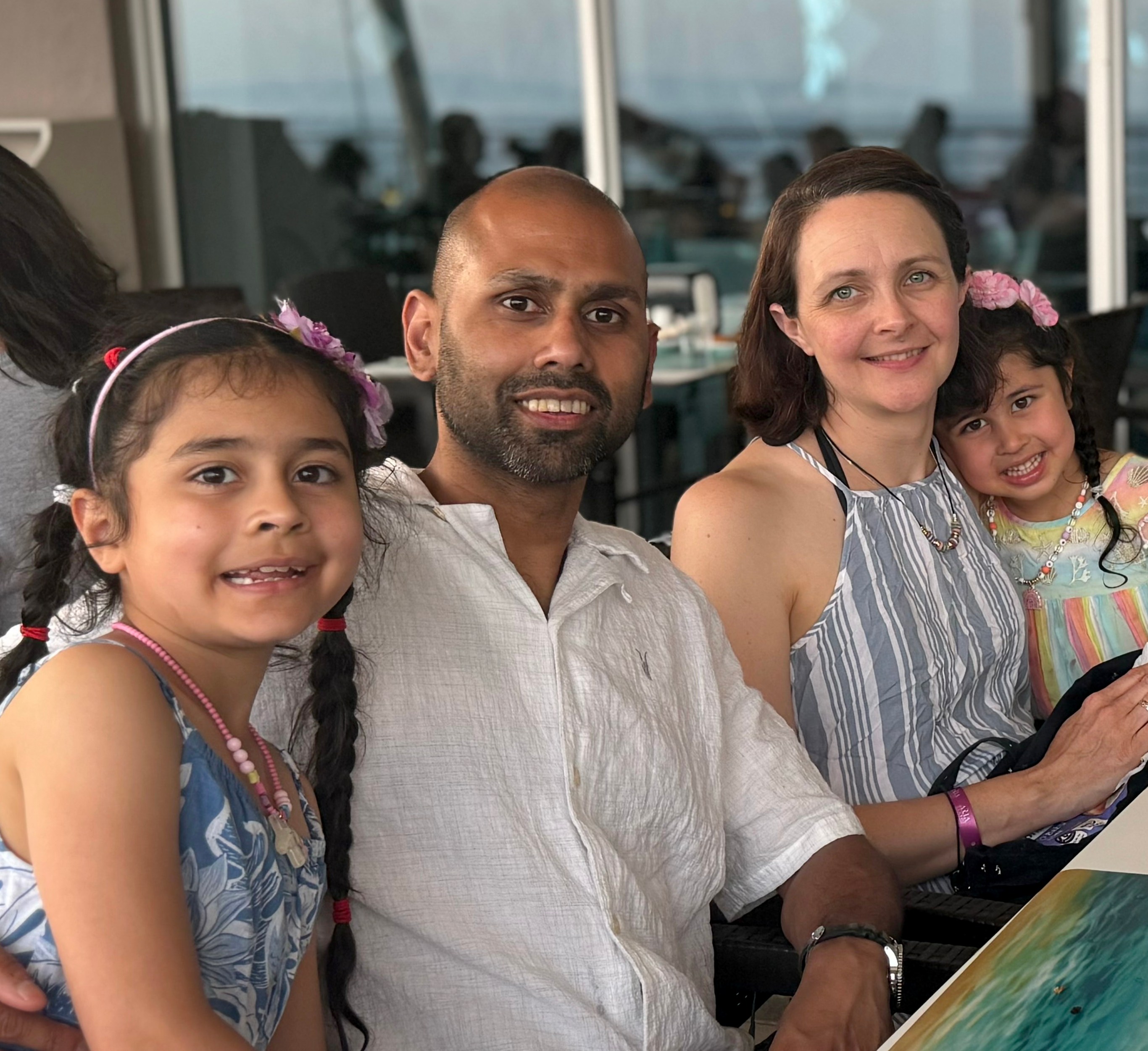 Melroy D’Souza with his wife, Joanna, and their children, Faye and Rachel